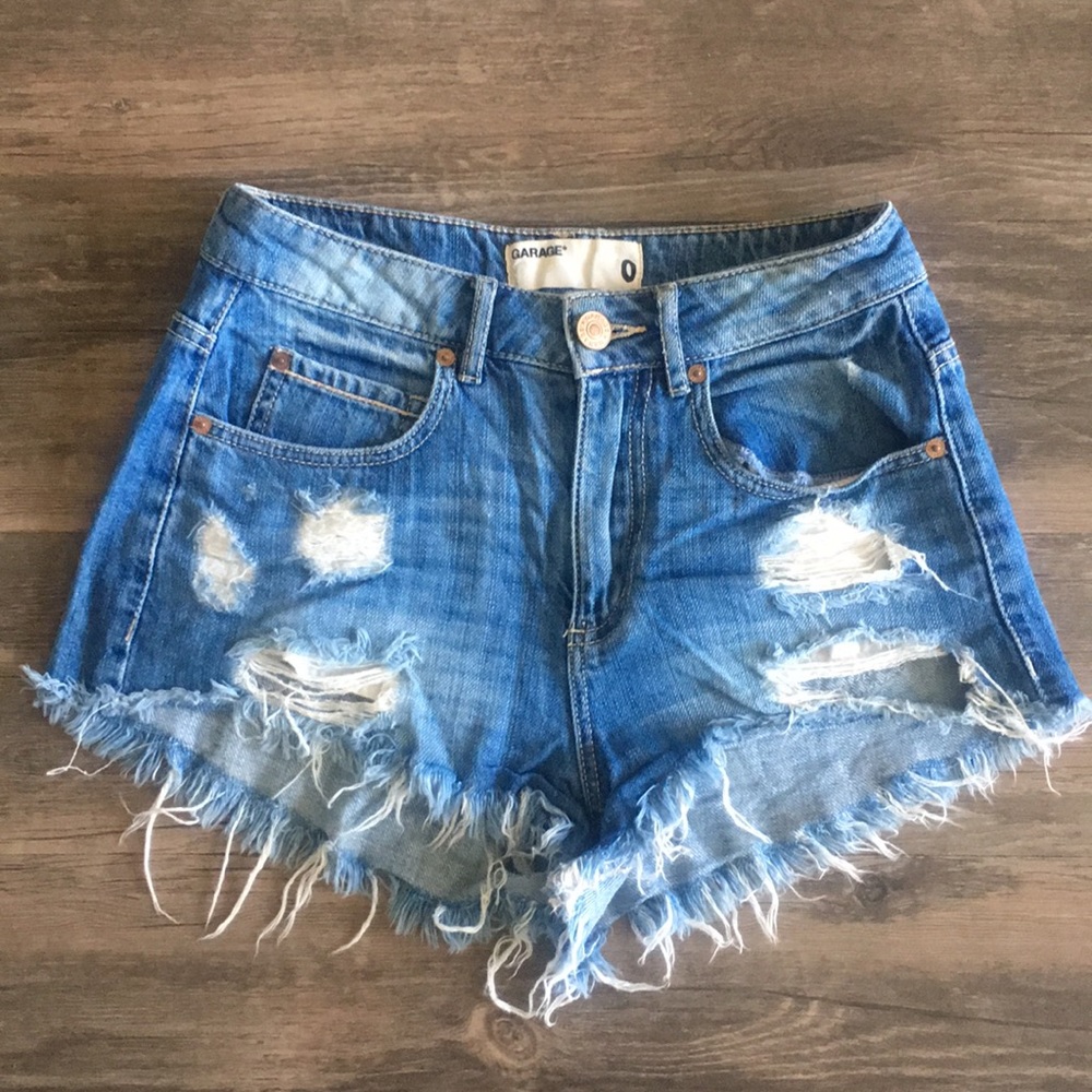 Distressed denim jean cut off shorts